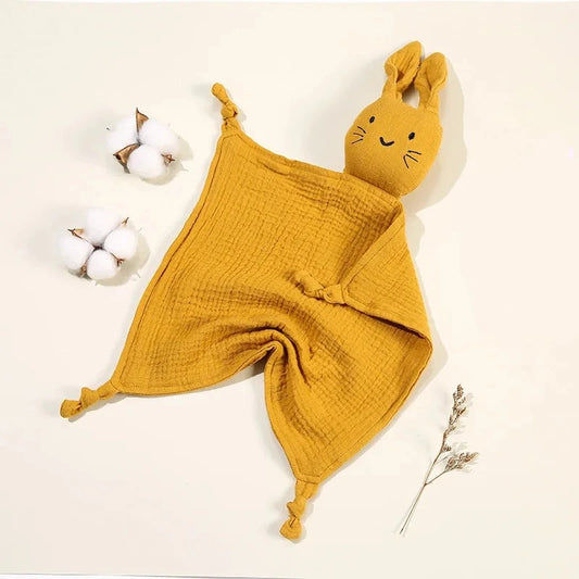 Soothe and pacify a baby girl or boy with this soft cotton muslin comforter blanket in the shape of a cute and cuddly bunny rabbit doll.&nbsp; The cotton and bamboo material preforms excellently as a baby toy, bib and blanket, and makes the perfect newborn gift.