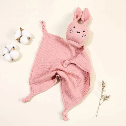 Soothe and pacify a baby girl or boy with this soft cotton muslin comforter blanket in the shape of a cute and cuddly bunny rabbit doll.&nbsp; The cotton and bamboo material preforms excellently as a baby toy, bib and blanket, and makes the perfect newborn gift.